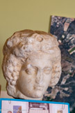 <center>Château de Peyrolles-en-Provence</center>Bureau du maire. Cette tête dite de Bacchus, dieu romain du vin, est en fait celle de Pomone, nymphe romaine qui veille sur les fruits. En marbre du Pentélique, cette tête de femme date du 1er siècle.